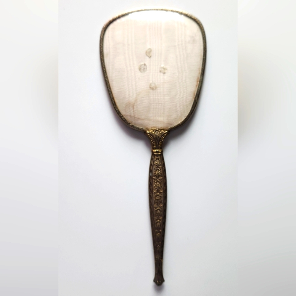 Vintage Handheld Mirror with Ornate Handle